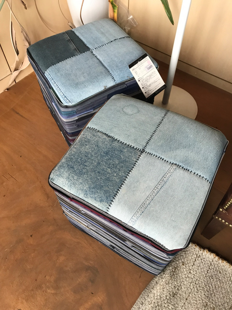 A pair of used jeans turned into a chair